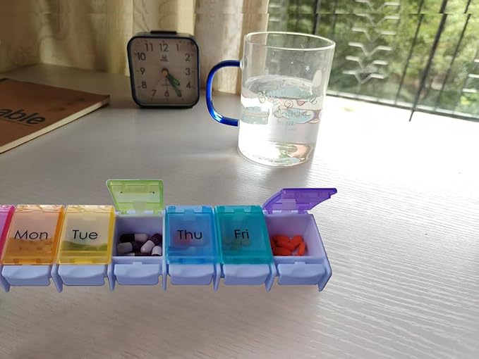 Extra Large Weekly 7 Day Pill Organizer with Spring Open Design,Push Button Pill Box with Rainbow lids,Portable Medicine case and 7 Large Compartment for Travel.