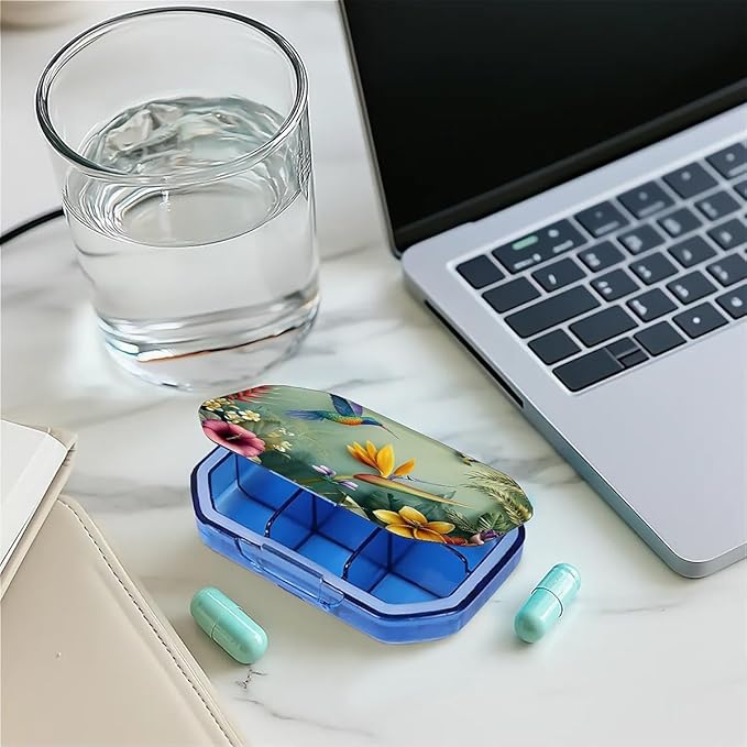 This Portable Hummingbird Tropical Flower Pattern 6 Compartment Pill Box Can Be Placed in A Pocket Or Wallet to Store Vitamins, Medicines Health Supplements Other Medications.