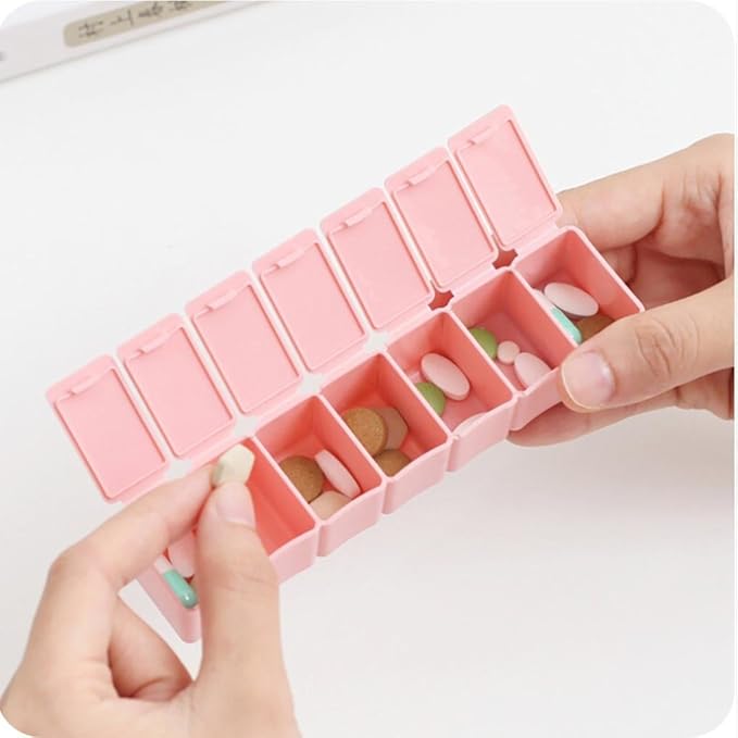 Portable Travel Pill Organizer with Moisture-Proof Design and 7 Compartments a Week to Hold Vitamins, Supplements and Medication (Pink)