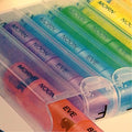 Pill Case | Portable Pop-up Pill Organizer | Weekly Color-Coded pods | Spring-Loaded Action | 28 Compartments | Large Vitamins Pills Organizer Great for Travel or Everyday Use