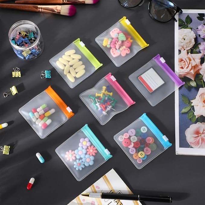Sherr 56 Pcs Zippered Pill Pouch Bags Pill Pocket Reusable Clear Plastic Pills Bags Translucent Travel Medicine Organizer Travel Storage Pouches with Slide Lock for Pills Small Items(Candy Color)