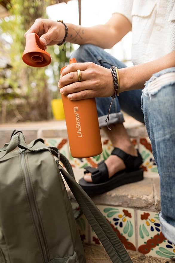 LifeStraw Go Series — Insulated Stainless Steel Water Filter Bottle for Travel and Everyday Use Removes Bacteria, Parasites and Microplastics, Improves Taste, 24oz Laguna Teal